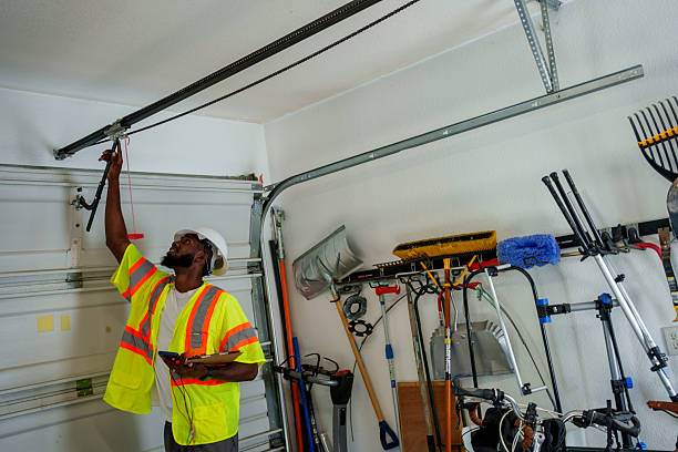 Professional Garage Door Panel Replacement technician working in Dubuque, IA